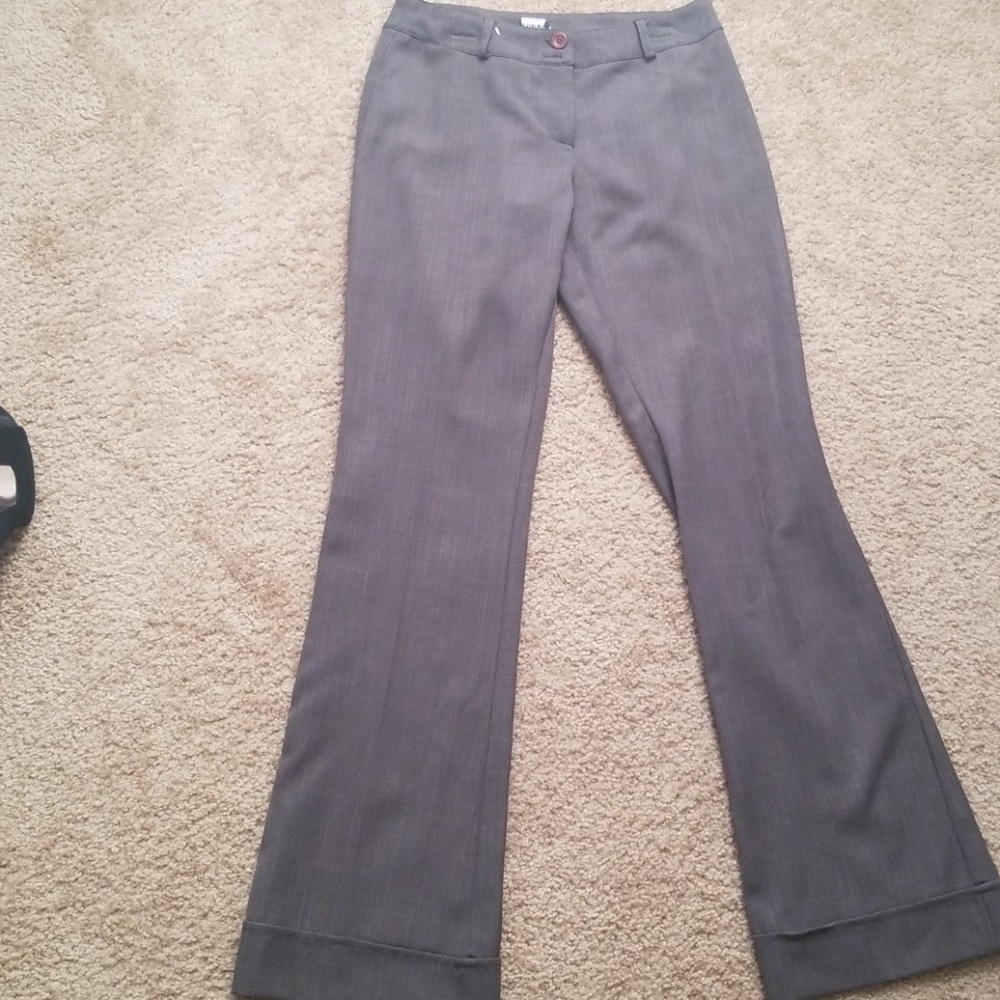 Gray flared pants by Jodi Kristopher.